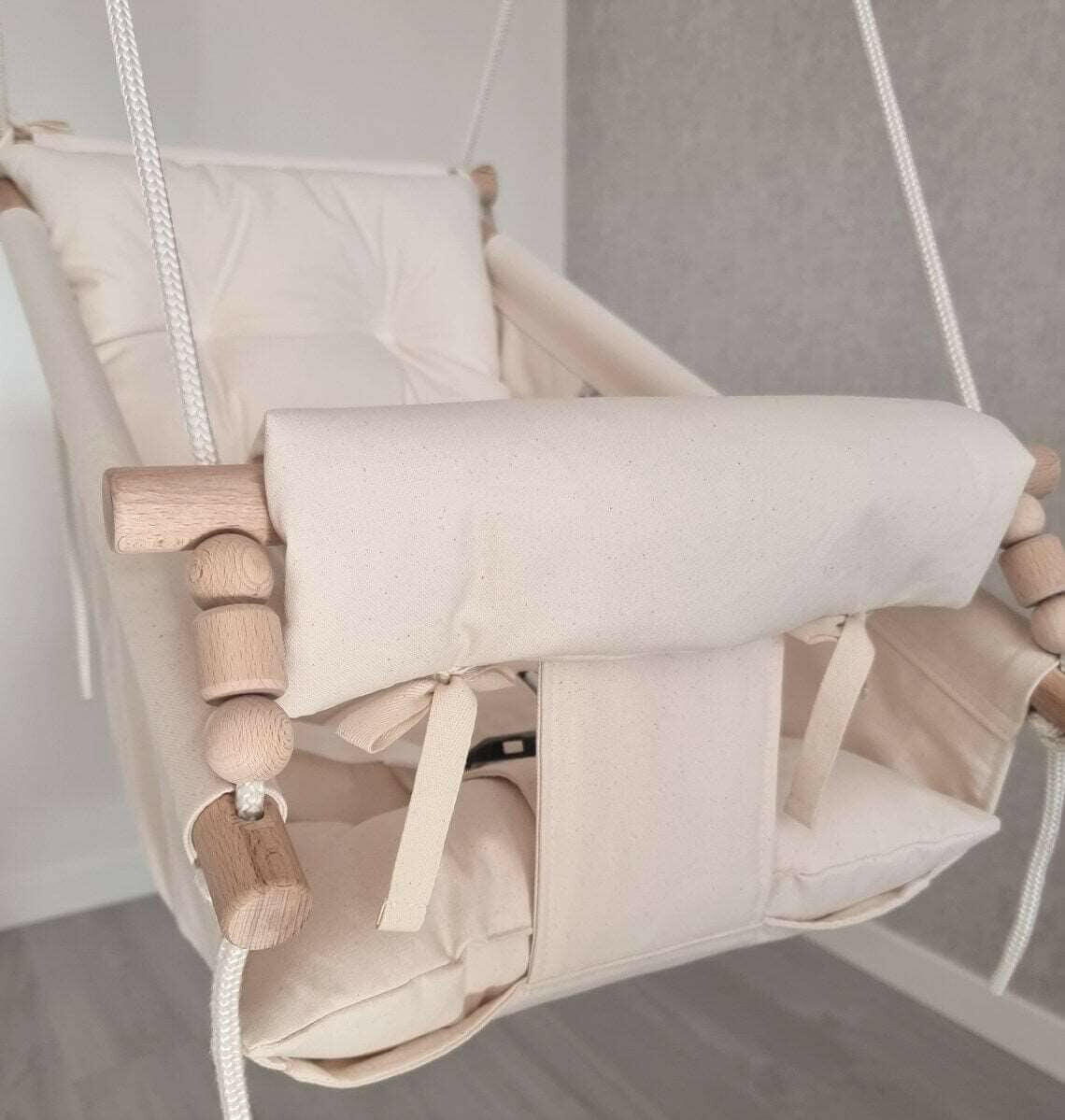 Große Babyschaukel Hängematte aus Baumwolle, creme weiß.
