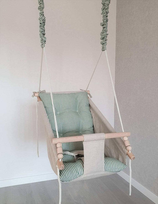 Große Babyschaukel Hängematte aus Leinen, grün gestreift.